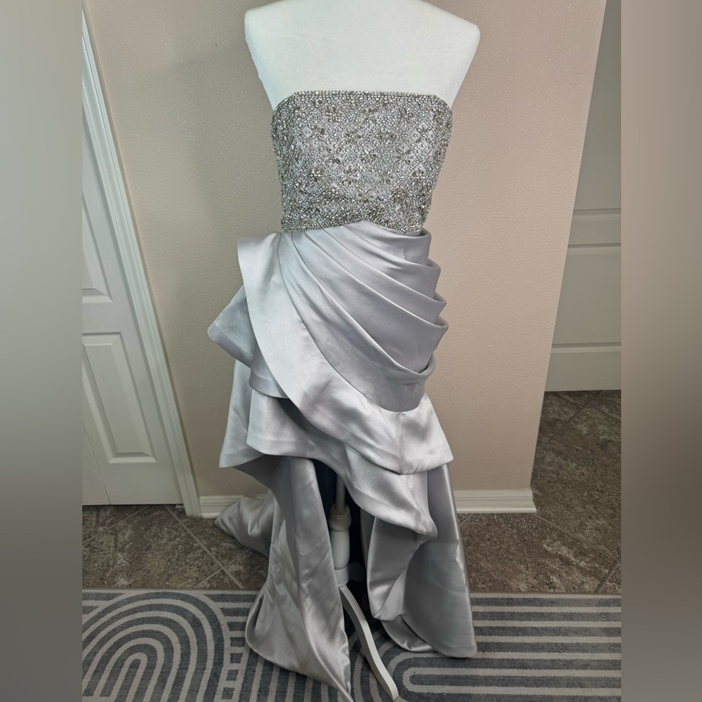 Jovani silver strapless special occasion dress size 4 It runs small at the torso